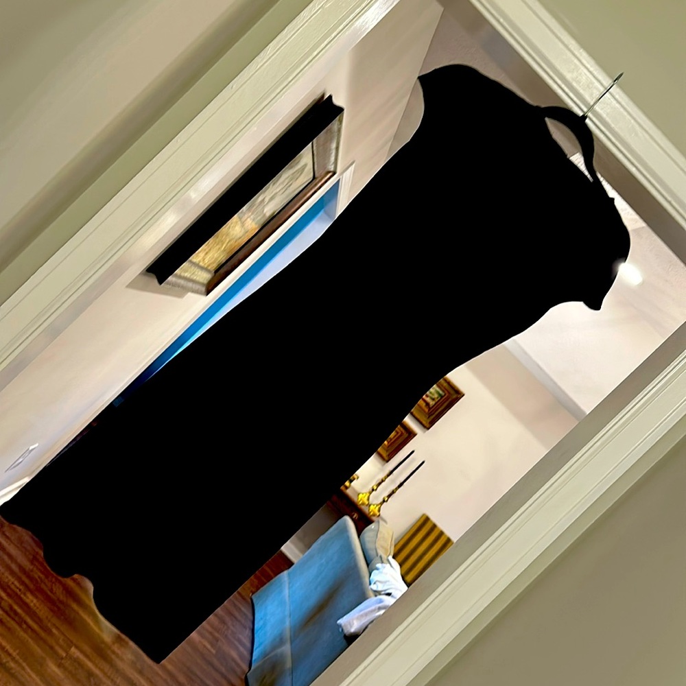 Fitted Knee Length Black Dress. Only worn one time and in like new condition.